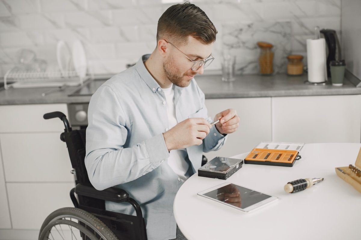 Man fixing a hard drive